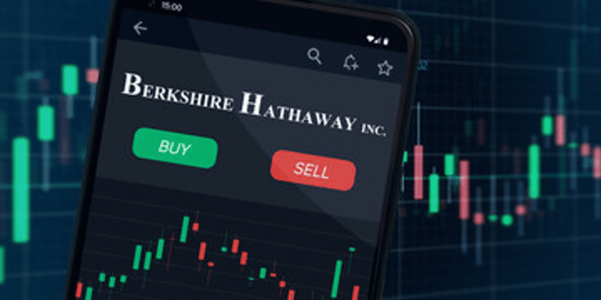 Phone screen showing buy sell options for berkshire hathaway with stock chart background.png