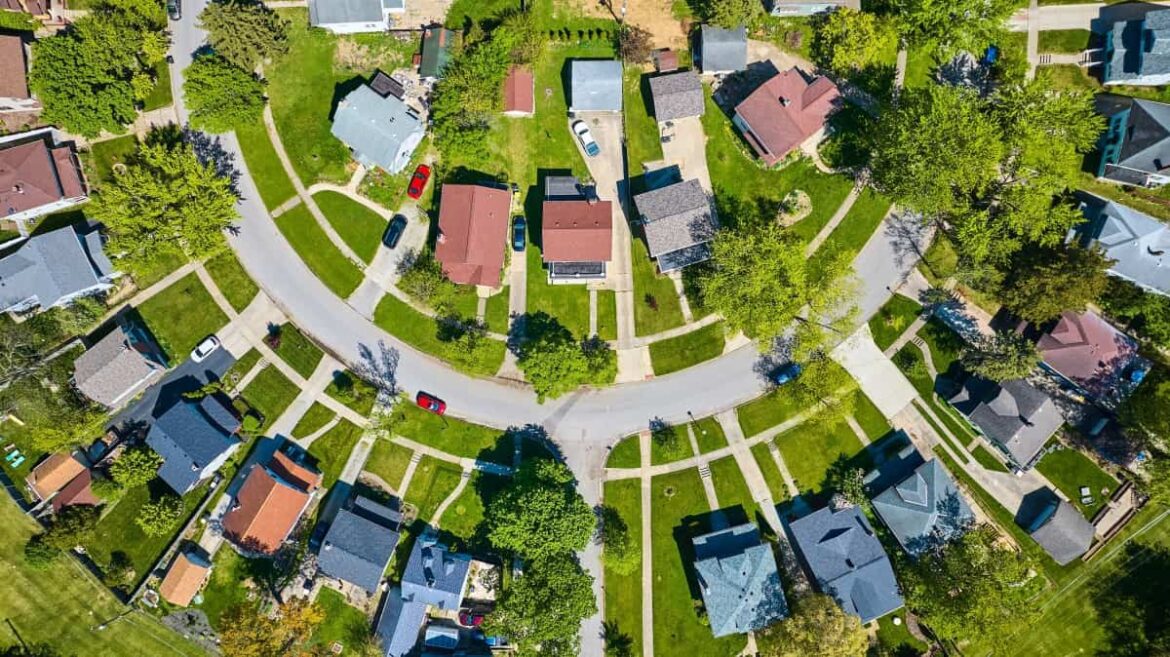 Downward-view-circle-road-in-neighborhood-with-houses-in-summer-aerial-HOA.jpg Downward view circle road in neighborhood with houses in summer aerial hoa.jpg