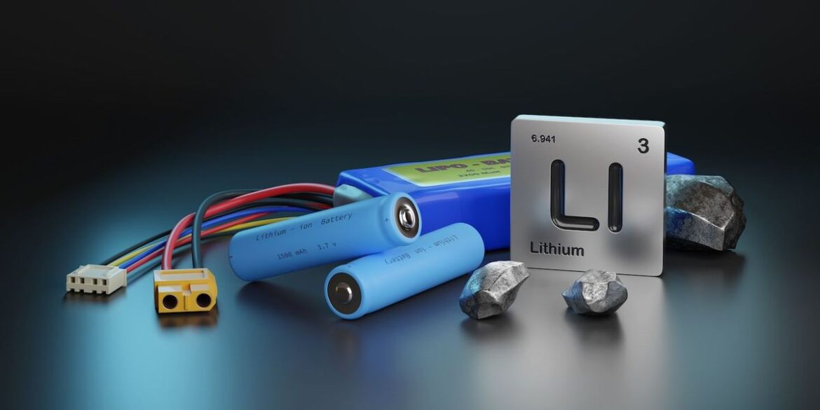 lithium-batteries-and-wires-with-lithium-periodic-symbol-and-rocks-on-a-dark-surface.jpg Lithium batteries and wires with lithium periodic symbol and rocks on a dark surface.jpg