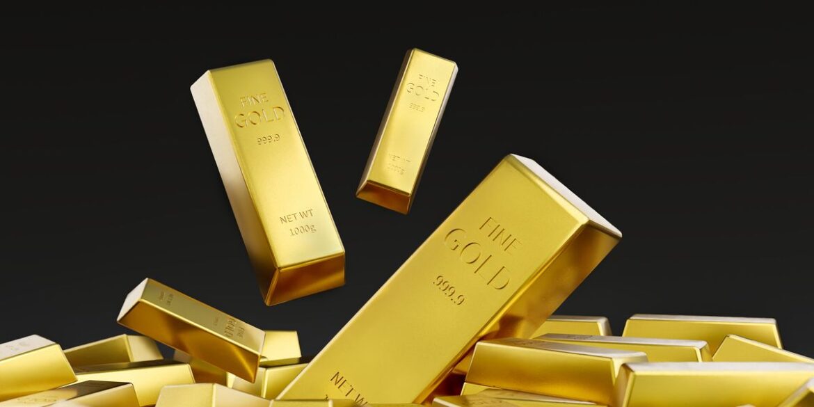 Pile of gold bars over black background.jpg