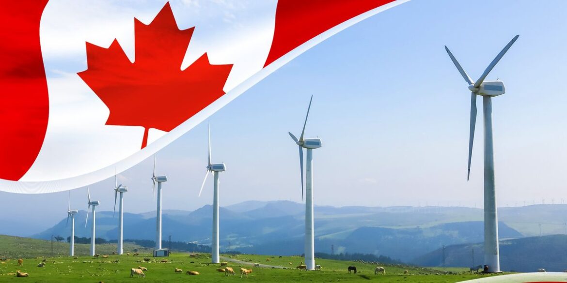 Field with windmills overlayed by canadian flag.jpg
