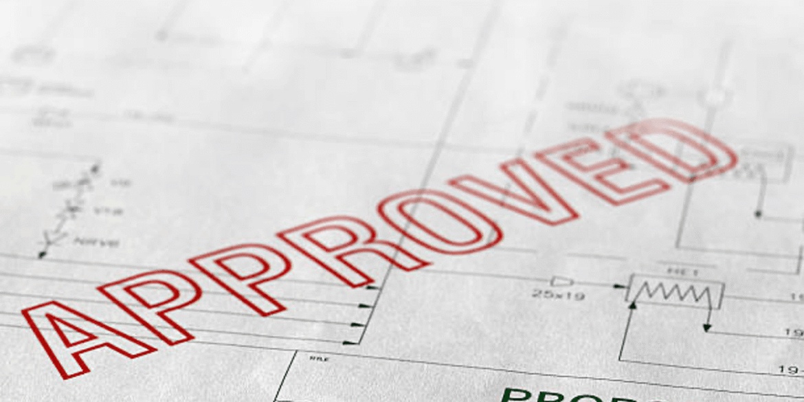 Red approved stamp over architectural proposal with technical drawings.png