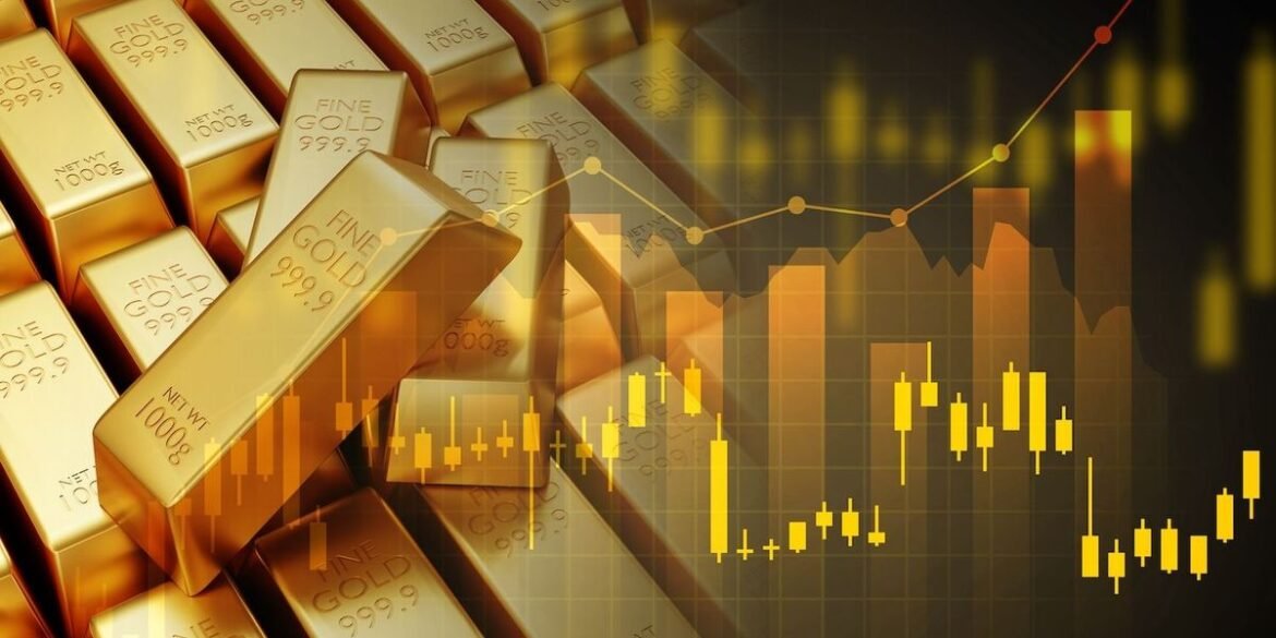 Gold bars and financial chart with rising trend in the background.jpg
