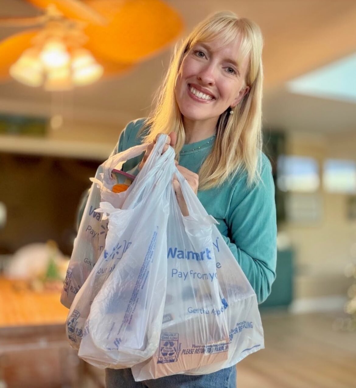 Grace holding groceries.jpg